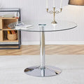 Table à manger circulaire moderne avec plateau en verre élégant et pieds en métal robustes pour divers espaces