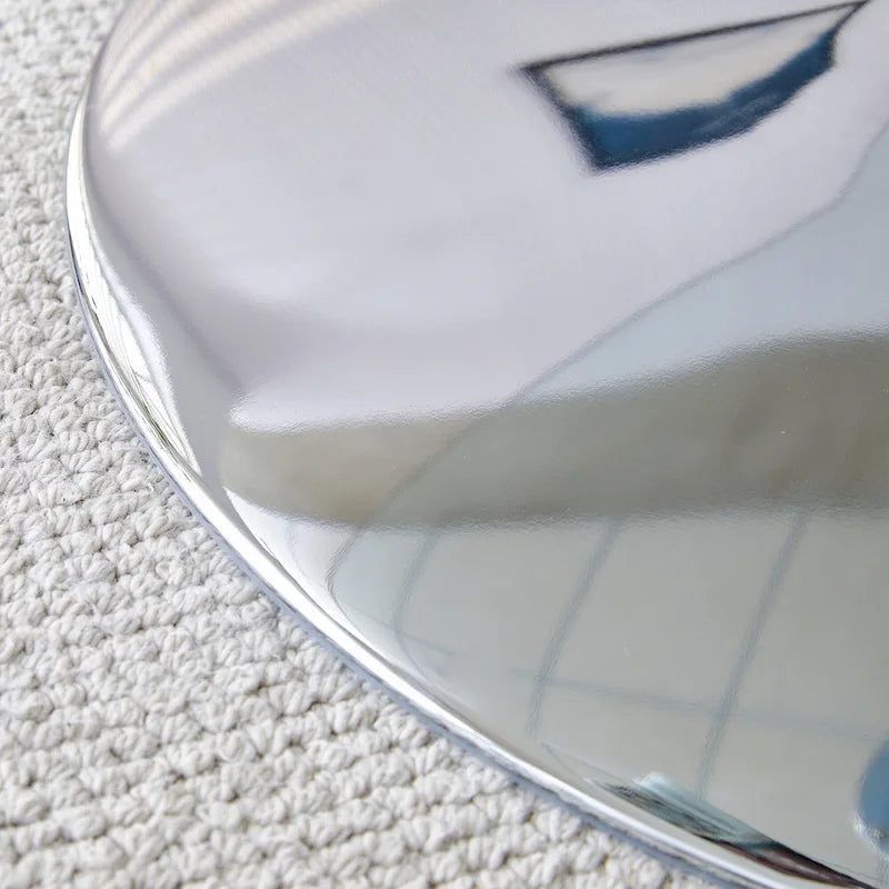 Table à manger circulaire moderne avec plateau en verre élégant et pieds en métal robustes pour divers espaces