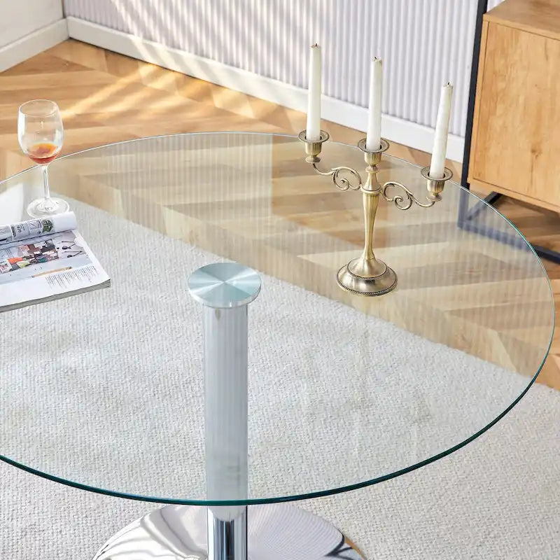 Table à manger circulaire moderne avec plateau en verre élégant et pieds en métal robustes pour divers espaces