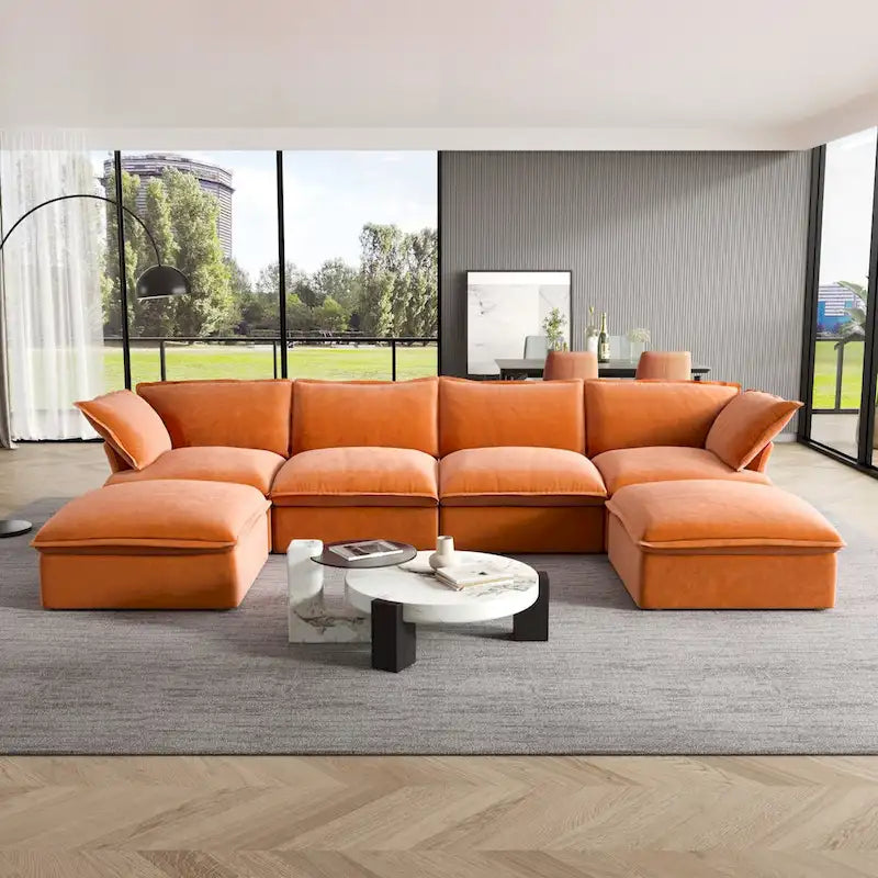 Canapé d'angle en velours en U avec assise large et profonde en plumes et duvet, convertible avec 2 poufs de rangement.