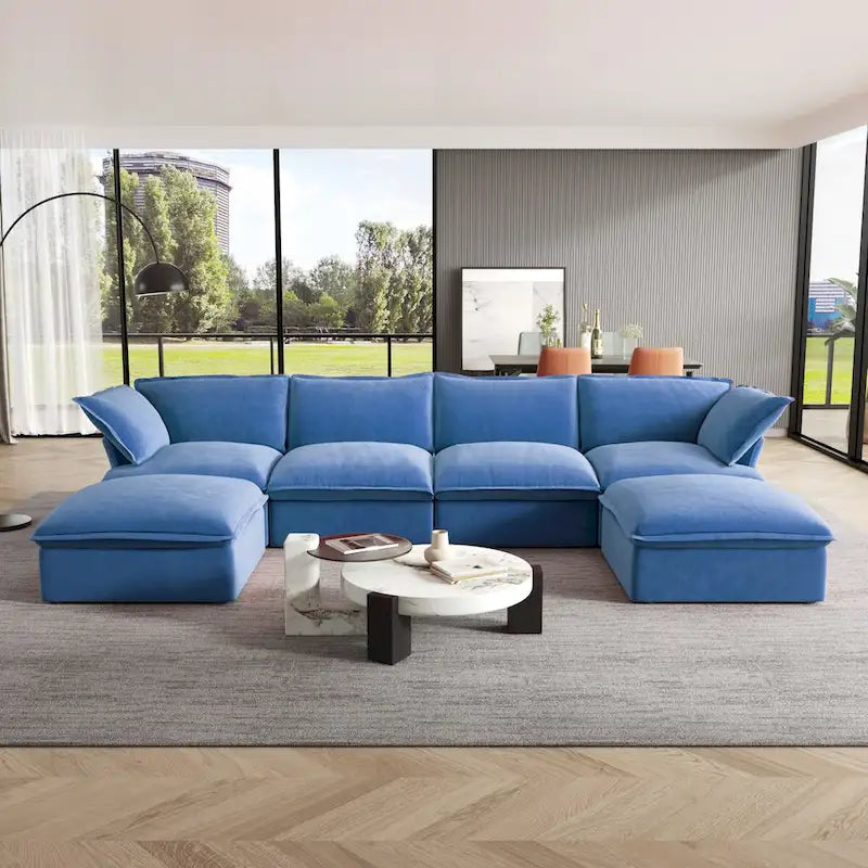 Canapé d'angle en velours en U avec assise large et profonde en plumes et duvet, convertible avec 2 poufs de rangement.