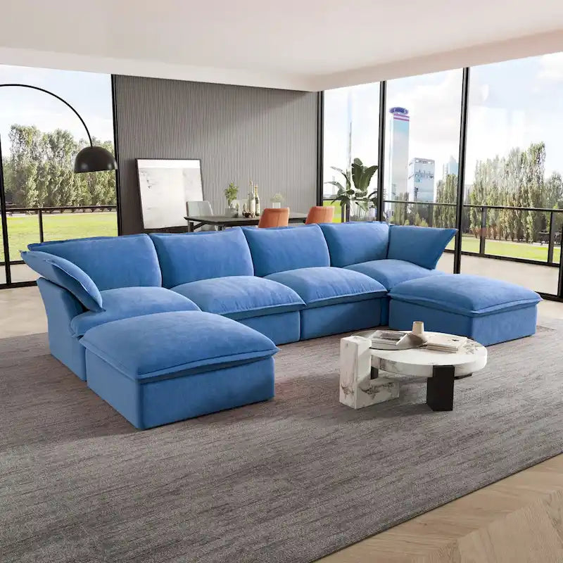 Canapé d'angle en velours en U avec assise large et profonde en plumes et duvet, convertible avec 2 poufs de rangement.