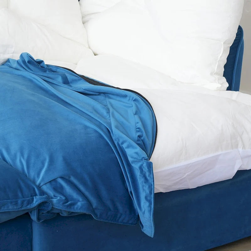 Canapé d'angle en velours en U avec assise large et profonde en plumes et duvet, convertible avec 2 poufs de rangement.